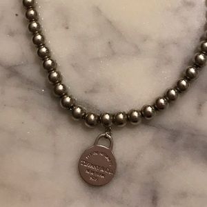 Tiffany & Co. silver bracelet with round charm